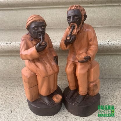 Escultura casal preto velho
